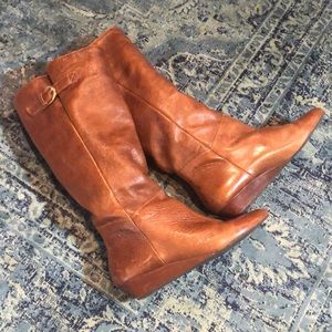 Tall brown leather boots